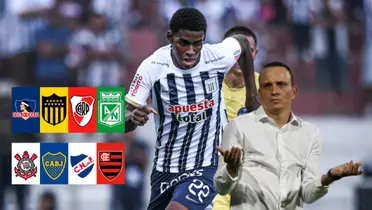 Víctor Guzmán jugando por Alianza Lima y debajo Alejandro Restrepo alzando los brazos