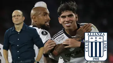 Alejandro Restrepo mirando para un costado, mientras Arturo Vidal celebra con un compañero en Colo Colo