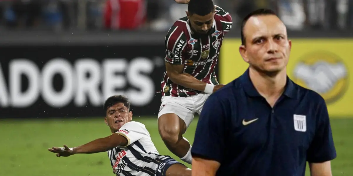 Alejandro Restrepo triste, mientras Jesús Castillo se barre a por el balón. FOTO: AFP