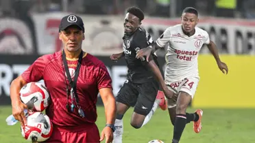 Fabián Bustos con pelotas en la mano y detrás Andy Polo en una acción del U vs Botafogo