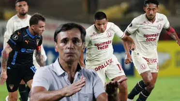 Fabián Bustos haciendo señas con las manos y Universitario jugando ante LDU