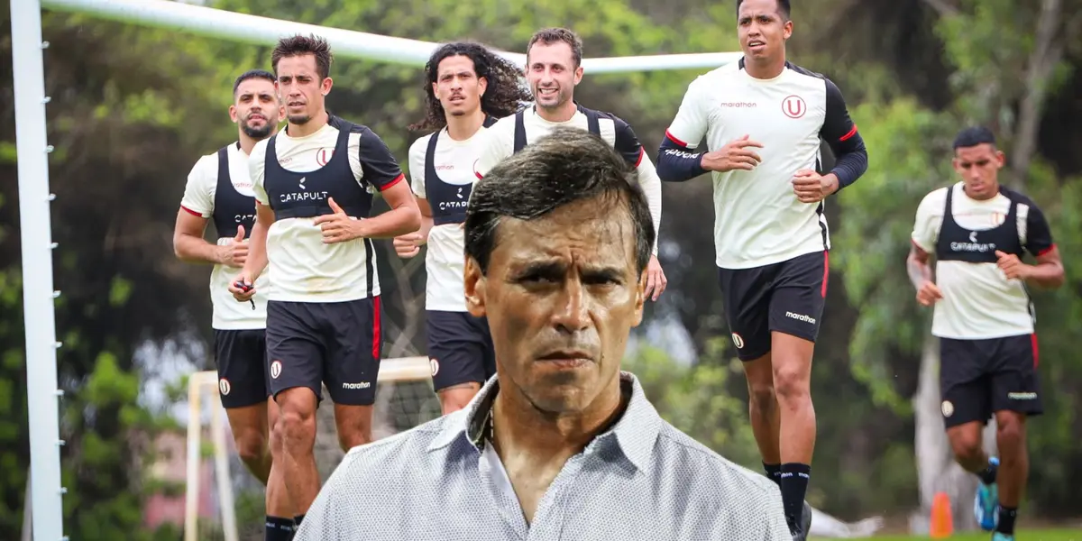 Fabián Bustos serio y los jugadores de la U entrenando