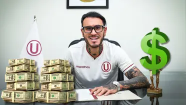 Gustavo Dulanto firmando su nuevo contrato con Universitario de Deportes