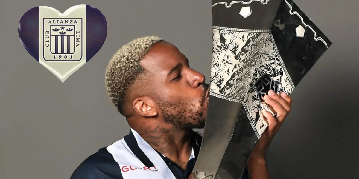 Jefferson Farfán besando la copa de campeón de la Liga 1