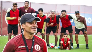 Jugadores de la U posando para la foto y Bustos sonriendo
