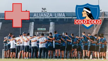 Jugadores en charla con el cuerpo técnico en un entrenamiento