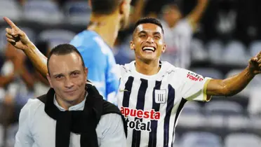 Kevin Serna celebra, mientras Alejandro Restrepo sonríe